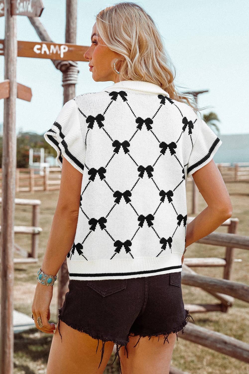 BOUNDARIES BowPrint Zipped Collar Sweater Top