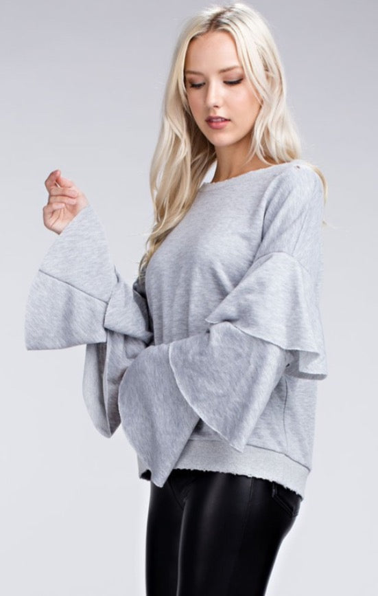 FLAUNT Layered Trumpet Sleeve Distressed Fleece Top