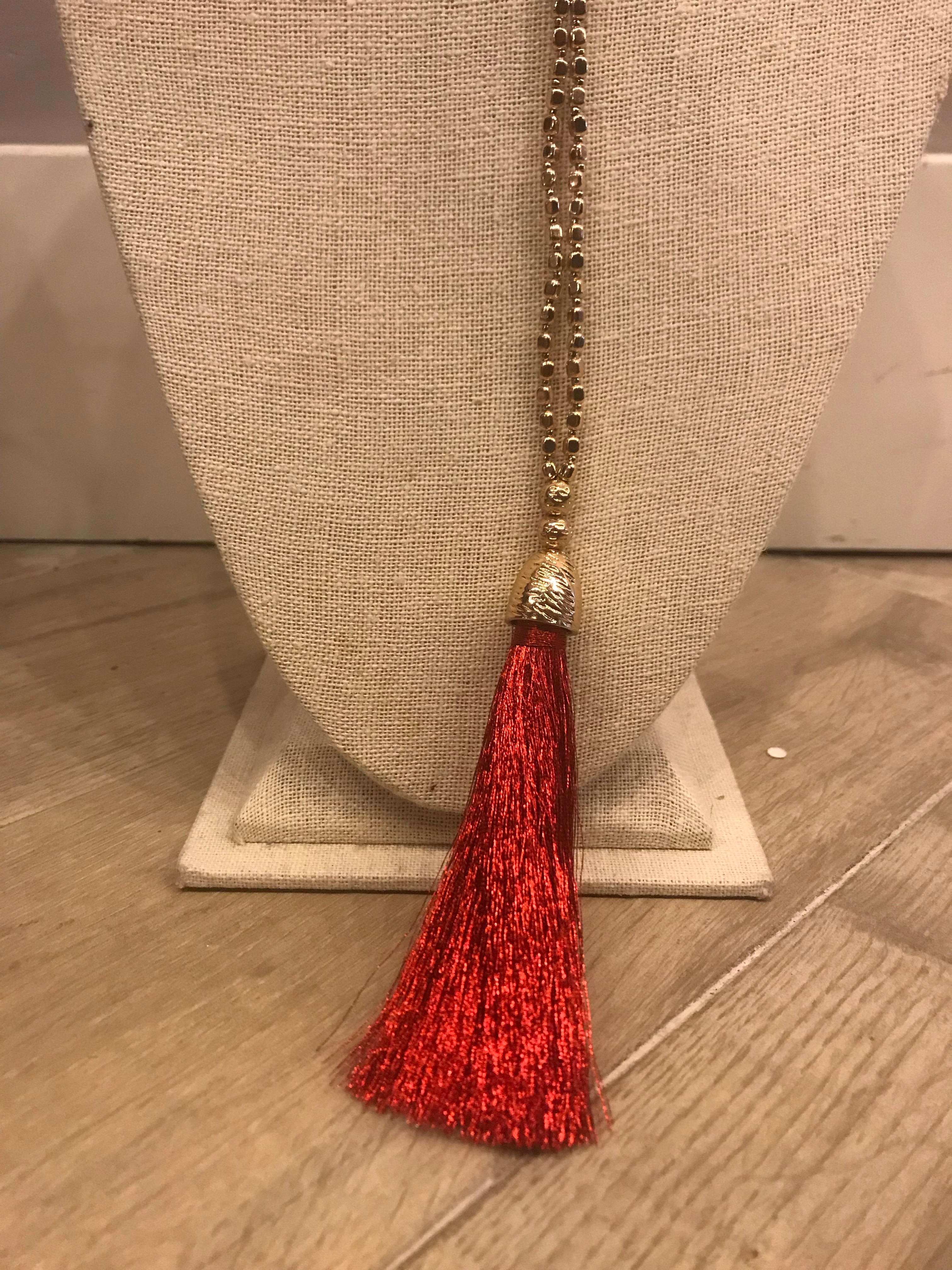 Gold beaded necklace with Red Tassel