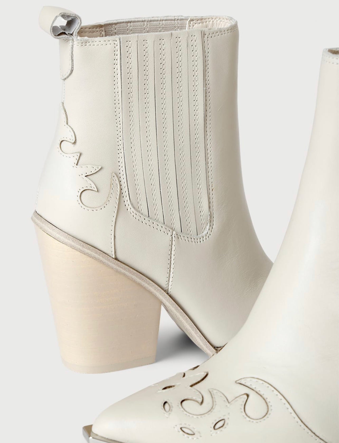 STEVE MADDEN Laser Cut TRIM Silver Tip Booties