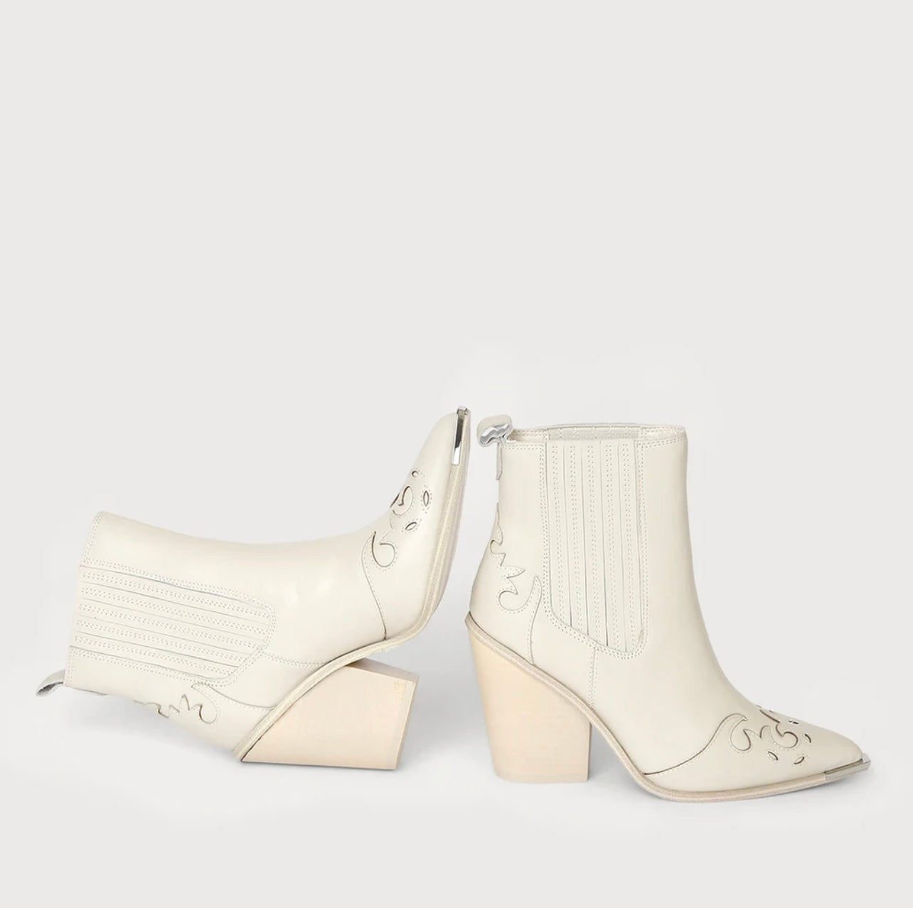 STEVE MADDEN Laser Cut TRIM Silver Tip Booties