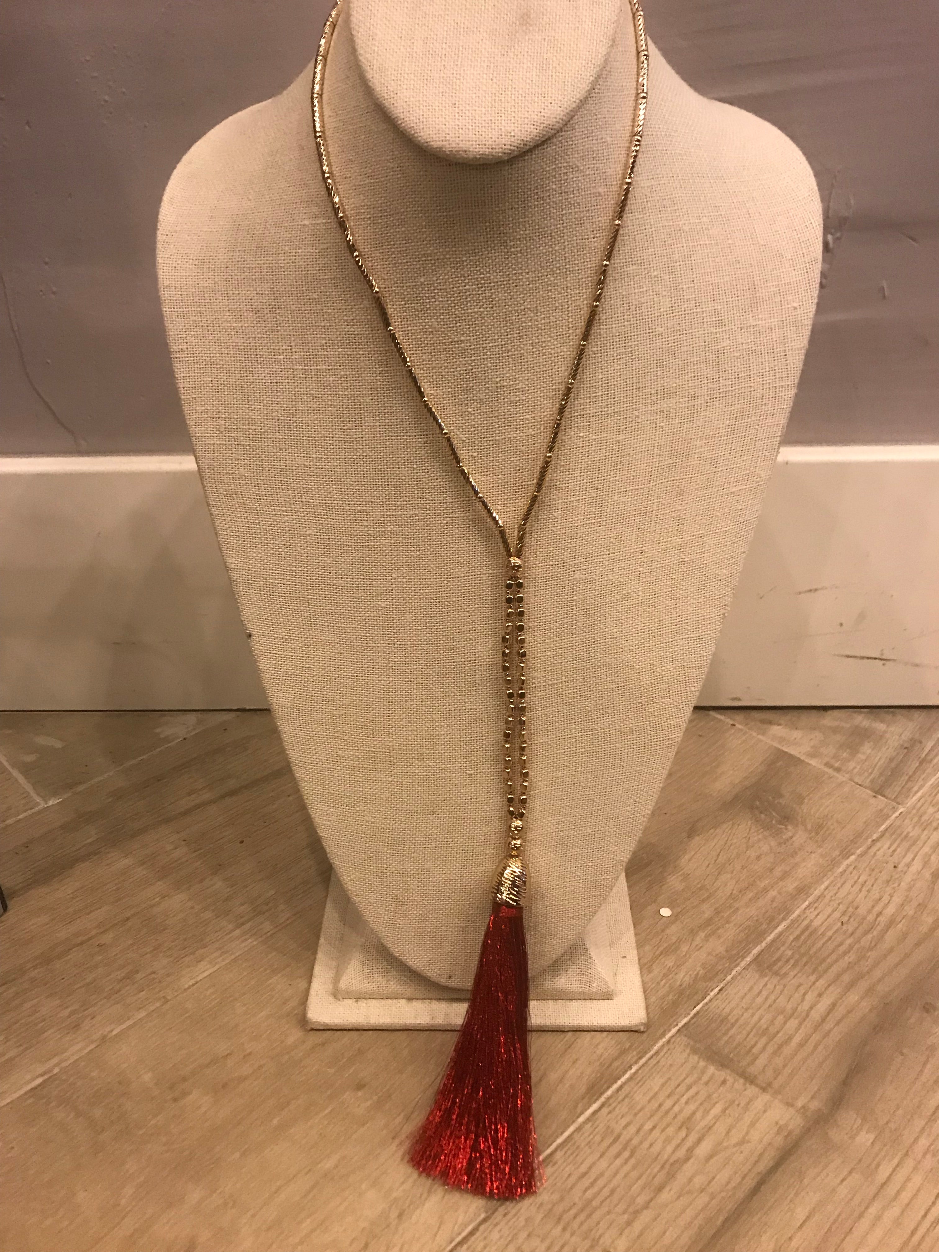 Gold beaded necklace with Red Tassel